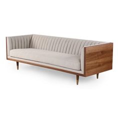 a wooden and upholstered couch on white background