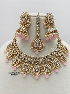 High quality elegant Kundan necklace set comes with beautiful jhumki earrings and tikka set/Kundan Polki Necklace/Reception/Wedding/bridal jewelry/ Indian jewelry /Kundan Jewelry/pink  All items are shipped from Brampton, Ontario, Canada. If you need your item by a certain day, please reach out to us for express delivery option before placing the order so that we can update the shipping for you. Standard shipping/delivery timeline Below are the delivery timeline estimates. We dispatch all orders by the next business day. ---> USA delivery timeline * 3-6 business days to major urban centers in USA. It may take 1-2 days extra to remote locations ---> Canada delivery timeline  * 2-3 business days - GTA  & Montreal  * 2-4  business days - Rest of Ontario/Quebec * 3-6 business days-  Rest of Ca Luxury Elegant Pink Kundan Necklace, Bridal Jewelry Indian, Kundan Polki Necklace, Brampton Ontario, Jewelry Kundan, Bride Necklace, Kundan Necklace Set, Necklace Set Indian, Kundan Jewelry