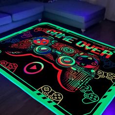 a glowing rug with an image of a video game controller on it