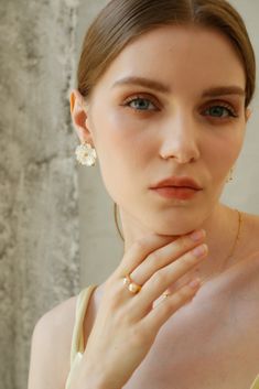 Capture the delicate beauty of spring with the Cherry Blossom Nacre Earrings, where blossoms meet pearls in a symphony of elegance. Each earring features intricately carved cherry blossom motifs adorned with luminous nacre pearls, evoking the ephemeral charm of blooming flowers. Perfect for adding a touch of romantic allure to any ensemble, these earrings are ideal for both daytime outings and evening affairs. Let them be your symbol of natural grace and timeless beauty. Let Them Be, Gemstone Earrings Gold, Delicate Beauty, Pearl Gemstone, Blooming Flowers, Personal Stylist, Gemstone Earrings, Timeless Beauty, Cherry Blossom