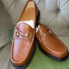 New Authentic Gucci Loafers With Horsebit, Color Says Brown But Looks Like Carmel/Light Brown, Moccasin Leather Loafers With Low Heel & Square Toe, Gg Print On Top Of Shoe In Leather Gold Tone Hardware, Leather Sole, 1” Heel.4” Platform, Very Comfortable, European Size 8, Fits Us Size 9, Includes Authenticity Card, Box & Dust Bags. Made In Italy Designer Loafers With Brogue Detailing And Almond Toe, Designer Gucci Loafers With Leather Lining, Gucci Leather Shoes For Galas With Round Toe, Gucci Leather Shoes With Round Toe For Galas, Gucci Leather Round Toe Shoes For Galas, Designer Brown Loafers With Branded Heel, Gucci Designer Leather Shoes With Round Toe, Brown Gucci Loafers With Rubber Sole, Gucci Brown Loafers With Rubber Sole