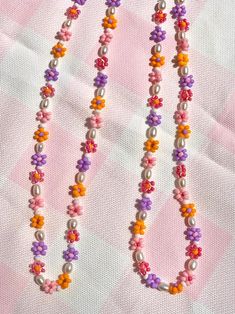 Mini Beaded Flower Choker Necklace With Freshwater Pearls | Etsy Cute Flower Beaded Necklaces With Colorful Beads, Cute Flower-shaped Colorful Beaded Necklaces, Handmade Cute Flower Beaded Necklaces, Cute Handmade Flower Beaded Necklaces, Pink Flower Necklaces With Tiny Beads, Pink Flower Necklace With Tiny Beads, Pink Flower-shaped Necklace With Tiny Beads, Flower Shaped Beaded Necklaces For Jewelry Making, Pink Flower-shaped Beaded Necklace With Beaded Chain