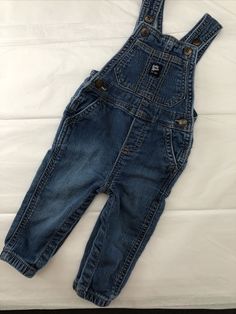 OshKosh B'Gosh 12M Baby Infant Unisex Denim Blue Jean Bib Overalls 100% Cotton. Casual Medium Wash Jeans For Playtime, Denim Blue Cotton Jeans For Playtime, Denim Blue Cotton Jeans, Denim Dangri, Jean Skirt Fashion, Adorable Babies, Bib Overalls, Fashion Line, Blue Denim Jeans