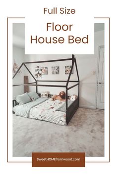 the full size floor house bed is shown