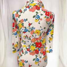 Stunning early sixties Ruth Barry top  * All cotton * Front button closure with pearlized buttons * 3/4 sleeves * Vibrant flower power pattern on white base * Gorgeous vintage condition - no flaws to note * Best fits modern Medium  Chest:  19" across Length:  23" 💛Favorite for discount💛 Please consult the item description in its entirety to ensure that your purchase will be a forever vintage love! Questions? Send me a message! I'm happy to relay extra measurements, photos, or anything you'd like. Red Swim Trunks, Surf Shorts, Long Maxi Skirts, Brown Top, Vibrant Flower, Beautiful Skirts, Collared Shirt, Vintage Love, Long Maxi