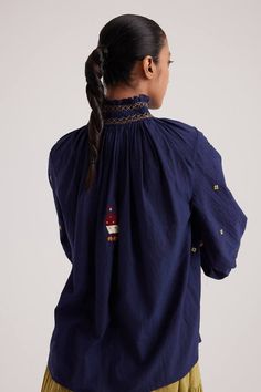 Navy blue top featuring hand-smocking on the neck, bishop sleeves, folk embroideries, and embroidered front button detailing. - Aza Fashions Navy Blue Top, Hand Smock, Folk Embroidery, Top For Women, Blue Top, Embroidered Top, Ulla Johnson, Top Pattern, Shop Blouses