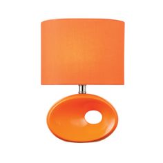 an orange table lamp with a round shade on it's base and a white background