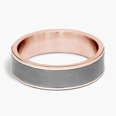 a rose gold and grey wedding ring