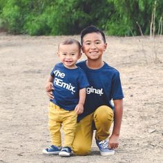 The Original The Remix The Encore® matching family set shown with heather navy shirts. These amazingly soft tees are perfect for family vacations, family photo shoots, baby shower gifts, and the cutest most unique pregnancy and birth announcements! See details of quality and fit below. Want to save 10% today? Sign up for my email list by copying and pasting this URL into your browser and a 10% off coupon code will appear: https://www.kaansdesigns.com/pages/email-sign-up WHEN WILL MY ORDER SHIP?: Blue Family Matching Shirts, Family Matching Blue Shirt, Casual Blue Shirt For Family Occasions, Blue Cotton Family Matching T-shirt, Family Photo Shoots, Sibling Pictures, Sibling Outfits, Email Sign, Sibling Shirts