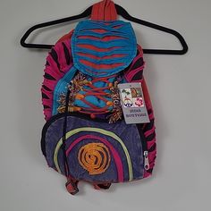 New India Boutique Hippie Style Peace Backpack. New With Tags. Made In Nepal. Discolorations In Favric Are Not Defects As Stated On The Tag. Small Zipper Pocket. Zipper Works Great. Drawstring And Velcro Closure. See Photos For Details. Casual Pink Backpack For Summer, Multicolor Backpack With Adjustable Strap For Festivals, Multicolor Backpack With Adjustable Strap For Trip, Multicolor Backpack With Adjustable Straps, Multicolor Standard Backpack With Adjustable Straps, Trendy Multicolor Bag With Adjustable Straps, Pink Summer Backpack With Adjustable Strap, Multicolor School Bag With Adjustable Straps, Casual Multicolor Backpack With Adjustable Straps