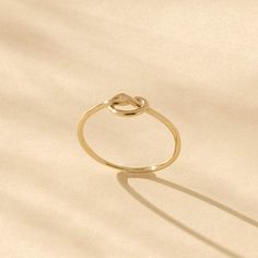 The Knot Ring made with the finest workmanship like a work of art, exhibit its flamboyant stance. This special design ring could be preferred to warm up the hearts in relationships tied tightly. The Knot Ring also means endless love for couples. The Knot Ring will tell your lover on your behalf that this love is eternal. - Made in 14k solid gold - Band Width: 1.12 mm / 0.04 inches - Top width: 5.61x8.35 mm / 0.22x0.32 inches - Thickness: 1.17 mm / 0.04 inches -This product comes with iconic Norm Mother Daughter Rings, Ring For Women Unique, Daughter Ring, Infinity Knot Ring, Gold Knot Ring, Friendship Ring, Love Knot Ring, Celtic Knot Ring, Luxury Jewelry Brands