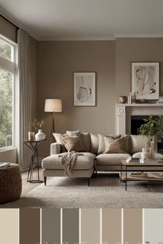 a living room filled with furniture next to a fire place and large windows in the background