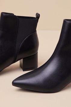 Step out looking sleek and chic in the Lulus Chase Black Pointed Toe Ankle Booties! These stylish slip-on booties have a smooth faux leather construction that shapes a pointed toe upper while trendy elastic gussets along the ankle-high shaft complete the look! Pull tab at back makes for easy on-and-off. 2" Wrapped Block Heel. Lightly Cushioned Insole. Rubber Sole Has Nonskid Markings. Man Made Materials. Imported. Lulus | Chase Black Pointed Toe Ankle Booties | Size 7.5. Pull Tab, Ankle Booties, Block Heels, Rubber Sole, Vegan Leather, Leather Upper, Faux Leather, Slip On, Size 7