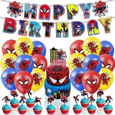 a birthday party with spiderman balloons and cupcakes