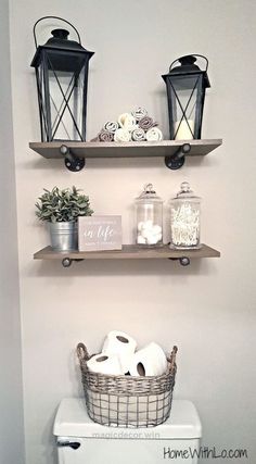 two shelves above a toilet in a bathroom