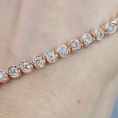 2.00-5.00 CT Round Cut Diamonds - Tennis Bracelet2.00 Carat: 41 round cut diamonds weighing 2.00 carat3.00 Carat: 39 round cut diamonds weighing 3.00 carat4.00 Carat: 36 round cut diamonds weighing 4.00 carat5.00 Carat: 33 round cut diamonds weighing 5.00 caratReward yourself with our 2.00-5.00 ct round cut diamonds - tennis bracelet MDL#104426. This tennis bracelet consists of 2.00 carat enchanting side diamonds. Select your choice of precious metal between 14 Karat, 18 Karat Yellow, White and Rose Gold Brilliant Cut Diamond Bracelet For Anniversary, Anniversary Rose Gold Tennis Bracelet With Diamond Accents, Anniversary Rose Gold Tennis Bracelet With Brilliant Cut, Diamond White Tennis Bracelet For Anniversary, Diamond White Round Diamond Bracelet For Anniversary, Diamond White Bangle For Anniversary, Anniversary Diamond Bracelet With Brilliant Cut, Rose Gold Diamond Bracelet With Round Cut Accents, Rose Gold Round Diamond Jubilee Bracelet