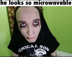 a woman with makeup on her face wearing a black hoodie that says, the looks so microwavevable