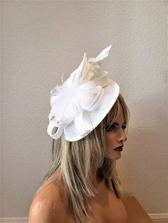 Classy white thick linen fascinator with binding feather flower and duck spike The hat sits on a matching satin headband or clip both included. You will receive in the mail 4-5 business days after purchase. White Fitted Headband For Spring, Fitted White Headband For Spring, Formal Fitted White Headband, White Mini Hat Headband For Kentucky Derby, White Formal Headband For Summer, White Summer Headband For Races, White Headband Fascinator For Church, White Headband Mini Hat For Kentucky Derby, White Formal Headband For Royal Ascot