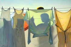 three dresses hanging on a clothes line with a person's shadow