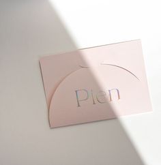 a close up of a piece of paper with the word plen on it and a circle