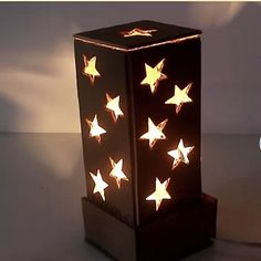 a lit up box with stars on it