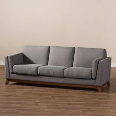 Baxton Studio Sava Mid-Century Modern Grey Fabric Upholstered Walnut Wood 3-Seater Sofa FredCo Modern Grey Sofa, Knitted Throw Blanket, Sofa Gray, Grey Fabric Sofa, Modern Loveseat, Mid Century Sofa, Wood Sofa, Stylish Sofa, Gray Sofa