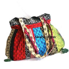 multicolored handbag with tassels on white background