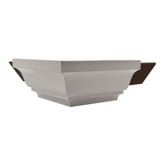 a white bowl with brown trim on it