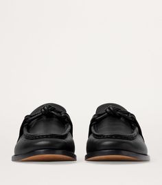 Find BOTTEGA VENETA Leather Astaire Loafers on Editorialist. If there's one brand that's renowned for butter-soft leather designs, it's Bottega Veneta. The Italian label cuts the Astaire loafers from the same smooth calfskin as its iconic accessories for a signature aesthetic, with a matching knot atop the tongue communicating the pair's premium origins without even a hint of written branding. Calf Leather Pointed Toe Slip-ons For Work, Formal Swift Leather Loafers With Leather Sole, Formal Slip-on Loafers In Swift Leather, Formal Slip-on Swift Leather Loafers, Formal Loafers In Swift Leather With Round Toe, Formal Swift Leather Loafers With Round Toe, Calf Leather Slip-ons With Stitched Sole For Work, Slip-on Swift Leather Shoes For Work, Swift Leather Slip-on Shoes For Work