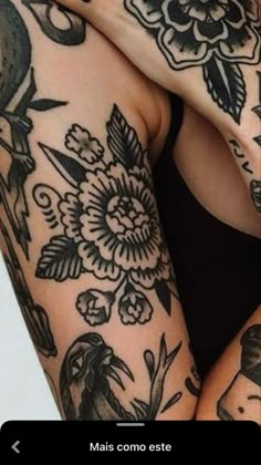 a woman has tattoos on her arms and legs