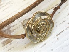 "Victorian silver & gold rose ring. Large resin flower ring. Chunky boho ring for women, unique boho bride jewelry. This stunning rose ring is a unique and modern jewelry piece. The gilded petals give an elegant, feminine look. The ring is a fashionable accessory for any occasion, an evening out or a final touch to your glamorous bridal dress. It will for sure enhance your boho-chic bridal look. The ring is a great gift to any women of any age! This ring is Hilawelner original design, made o Bohemian Rose Gold Rings For Gift, Bohemian Rose Gold Rings As Gift, Adjustable Gold Ring With Rose Design, Bohemian Jewelry With Rose Design For Gift, Bohemian Jewelry With Rose Design As Gift, Rose Gold Flower Ring As A Gift, Bohemian Rose Design Jewelry For Gifts, Bohemian Rose Design Jewelry Gift, Boho Bride Jewelry