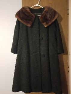 This vintage fur coat for ladies is a true gem for any fashion enthusiast. With its timeless design and high-quality materials, it is sure to make a statement wherever you go. The coat is made for women and will fit like a dream, no matter your body type. Its brand is vintage, which adds an extra layer of style and sophistication to this already exquisite piece. The coat is perfect for any occasion, whether it be a night out on the town or a formal event. You will be the envy of all your friends with this beautiful fur coat. It is a must-have for any fashion-forward woman who wants to stand out from the crowd. Don't miss your chance to own this one-of-a-kind piece. Vintage Faux Fur Outerwear With Fur Trim, Vintage Faux Fur Outerwear With Trim, Vintage Faux Fur Lined Outerwear, Vintage Faux Fur Coat For Cold Weather, Formal Long Fur Coat For Winter, Formal Faux Fur Winter Outerwear, Formal Faux Fur Outerwear For Winter, Faux Fur Lined Evening Coat For Fall, Formal Winter Faux Fur Coat