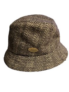 KANGOL Heritage Collection Small Wool Herringbone Gaffer Trilby Plaid Hat 6843KG. Classic Brown Bucket Hat, Classic Brown Bucket Hat With Short Brim, Classic Hat With Herringbone Pattern And Curved Brim, Classic Hat With Curved Brim And Herringbone Pattern, Classic Curved Brim Hat With Herringbone Pattern, Adjustable Brimmed Hat With Herringbone Pattern, Classic Herringbone Pattern Hat For Outdoor, Classic Outdoor Hat With Herringbone Pattern, Adjustable Herringbone Hat With Short Brim