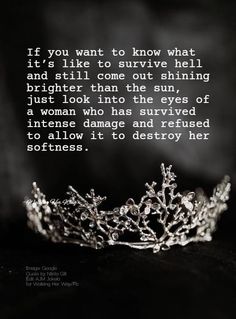 a tiara with an inspirational quote written on the front and back side, in black and white