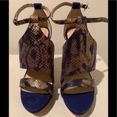 Amazing! Rare Brand New! Bebe Stiletto Cobalt/Navy Blue An Gold Snakeskin Shimmery Print! 6 Inch Heel Ankle Strap Sandals. Size 7 Smoke-Free Home No Pets Not Returnable Blue Leather Heels For Night Out, Blue Wedge Heels For Evening, Blue Wedge Heel Sandals For Evening, Chic Royal Blue High Heels, Snake Heels, 6 Inch Heels, Ankle Strap Sandals, Strap Sandals, Blue Gold