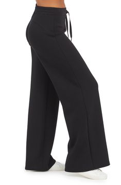 These throw-on-and-go pants is made from spacer fabric that's engineered with a cushiony feel that's as light as air. 30" inseam, 26" leg opening, 12" front rise, 15" back rise (size medium) Elastic/drawstring waist 47% modal, 46% polyester, 7% elastane Machine wash, tumble dry Imported Functional Bottoms With Minimal Stretch, Black Athleisure Pants With Slight Stretch, Black Athleisure Pants With Minimal Stretch, Sporty Pants With Minimal Stretch, Functional Wide Leg Stretch Pants, Functional Stretch Wide Leg Pants, Black Elastane Pants With Comfort Waistband, Black Pants With Comfort Waistband, Versatile Black Sweatpants With 4-way Stretch