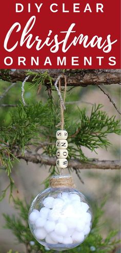 a christmas ornament hanging from a tree with text overlay that reads diy clear christmas ornaments