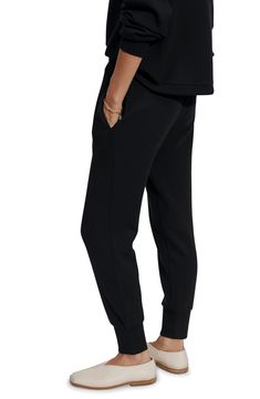 Cut slim from the brand's DoubleSoft fabric, these joggers are detailed with ribbed cuffs and a hidden drawcord to personalize your most comfortable fit. 25 1/2" inseam; 10" leg opening; 11 1/2" front rise; 17" back rise (size Medium) Elastic waist with internal drawcord 72% viscose, 23% polyester, 5% elastane Machine wash, dry flat Imported Sporty Joggers With Cuffed Ankles, Athleisure Pants With Elastic Cuffs, Sporty Joggers With Relaxed Fit And Cuffed Ankles, Sporty Stretch Joggers With Cuffed Ankles, Black Joggers With Ribbed Waistband And Tapered Leg, Athleisure Stretch Joggers With Cuffed Ankles, Black Tapered Leg Joggers With Ribbed Waistband, Black Tapered Joggers With Ribbed Waistband, Black Athleisure Joggers With Elastic Cuffs