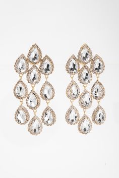 These elegant Emily Rhinestone Chain Clip-On Earrings feature a stunning chain design adorned with sparkling rhinestones. The clip-on style provides comfortable wear for non-pierced ears. Enhance any outfit with these timeless, glamorous earrings. SizeLength 3.5 in QualityCrafted with high quality materials for endurance. ImportedEC13529 Glamorous Earrings, Royal Blue And Gold, Rhinestone Chain, Chain Design, First They Came, Pierced Ears, Red Gold, Blue And Silver, Blue Gold