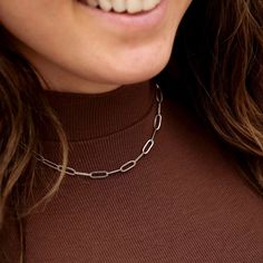 Looking for a minimal yet eye-catching necklace to compliment your everyday style? Our 4mm paperclip chain necklace is a modern, yet minimalist necklace for women that features a tarnish-proof chain design using dainty, paperclip styled links. Available in silver and gold. 16" +2" extender chain length perfect for layering 18k gold over stainless steel 100% waterproof Non-tarnish hypoallergenic Modern Stainless Steel Necklace With Paperclip Chain, Everyday Cable Chain Link Necklace, Everyday Paperclip Cable Chain Necklace, Everyday Link Chain Necklace With Paperclip Chain, Trendy Paperclip Cable Chain Bracelet, Everyday Oval Link Paperclip Chain Necklace, Stainless Steel Paperclip Chain Necklace, Everyday Paperclip Chain Link Necklace, Silver Tarnish-resistant Paperclip Chain Bracelet