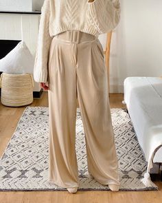 Our soft, high-waisted Velvet Tailored Wide Leg Pants are an effortlessly chic style in a beautiful shade. We are obsessed with this flattering wide leg style that comfortable fits at the waist with an elastic back and flat front waistband. It features a matching adjustable and detachable belt to cinch in the waist, front zip closure and metal hook and side pockets. Velvet luxe, we recommend pairing these with our Silky Blouse Reverie and a tan ankle boot for a sophisticated look or with our Tur Velvet Pants Outfit Fall, Velvet Pants Outfit, Tan Trousers, Tan Ankle Boots, Comfortable Fits, Velvet Trousers, Professional Office, Neutral Style, Womens Trousers