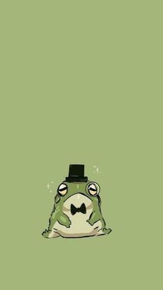 a frog wearing a top hat and bow tie sitting on the ground with its eyes closed