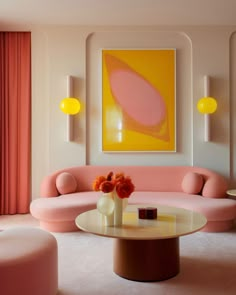 a living room filled with furniture and pink walls