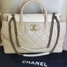 Beautiful Authentic Chanel Portobello Quilted Lambskin Logo Large Chain Strap Cc Turnlock Tote Handbag Great Looking Purse, Always Bound To Be A Stunning , Elegant And Fun Classic, Goes With Almost Every Outfit. Makes An Awesome Everyday Bag, Great For Work Or Play, Go From Business Pro To Light Fun Bag For A Night Out. Great Pre-Owned Condition. I Will Give It An 8/10 Condition Wise. Overall, Still Really Nice Looking Handbag Condition: ** Some Loss Of Shape When Empty From Storing It ** Minor Luxury White Shoulder Bag With Cc Turnlock Closure, Classic White Bag With Cc Turnlock Closure, White Bags With Cc Turnlock Closure For Evening, White Evening Bag With Cc Turnlock Closure, White Leather Shoulder Bag With Cc Turnlock Closure, Designer White Shoulder Bag With Cc Turnlock Closure, Elegant White Shoulder Bag With Cc Turnlock Closure, Designer Shoulder Bag With Cc Turnlock For Shopping, Designer Tote Shoulder Bag With Cc Turnlock Closure