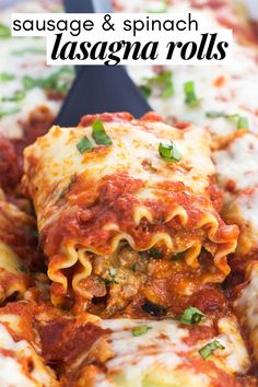 lasagna rolls with sauce and spinach on top