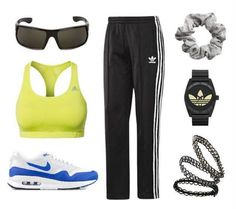 a woman's outfit and accessories including sneakers, watch, sunglasses, bracelets