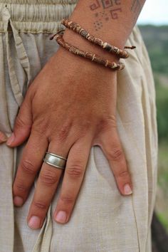 Handmade Tulsi Wood Tribal Bracelet, Adjustable Size, Unisex Small beads *Tulsi (Holy Basil) Wood Bracelet with 2 Strands. Pic 1-2 the model are wearing 2 bracelets (we recommend!) *Tulsi beads are worn traditionally in India for Purification and Protection and is thought to be the most sacred of woods. The plant of Tulsi is believed to be the incarnation of the Divine itself. Earthy Jewelry, Holy Basil, Hippie Bracelets, Wood Bracelet, Multi Strand Bracelet, Small Beads, Wood Necklace, Mala Bracelet, Unisex Bracelets