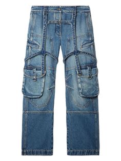 These cargo denim jeans are the perfect blend of comfort and style, with a mid-rise fit and wide legs for a relaxed and effortless look. The harness detail adds a touch of edgy flair, while the multiple pockets offer both functionality and a cool, utilitarian vibe. Whether you're running errands or hanging out with friends, these jeans have got you covered. Indigo blue cotton denim Concealed fly and button fastening Two side slit pockets Rear welt pocket and rear flap pocket Two front cargo pock Off White Jeans, Jeans Cargo, Wardrobe Design, Leather Cap, Women Cargos, Cargo Jeans, Women's Wardrobe, Indigo Blue, Denim Pant