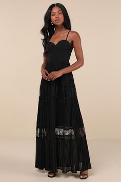 The compliments will never end once you make your entrance in the Lulus Stunning RSVP Black Pleated Lace Sleeveless Bustier Maxi Dress! Airy woven chiffon shapes this memorable dress that falls from adjustable spaghetti straps into a sweetheart neckline and a bustier-style bodice with supportive boning. High, fitted waist tops an accordion-pleated, A-line skirt that boasts ruffled, sheer lace panels as it falls to an elegant maxi hem. Hidden back zipper/clasp. Fit: This garment fits true to size Black Strapless Chiffon Dress, Black Dress With Sweetheart Neckline And Adjustable Straps, Black Summer Maxi Dress With Corset Back, Black Spaghetti Strap Dress With Pleated Bodice, Black Dress With Pleated Bodice And Spaghetti Straps, Black Sleeveless Maxi Dress With Corset Back, Summer Black Maxi Dress With Fitted Bodice, Chiffon Spaghetti Strap Maxi Dress For Night Out, Black Maxi Dress With Sweetheart Neckline And Lined Bodice