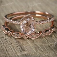 two rose gold wedding rings with an oval morganite